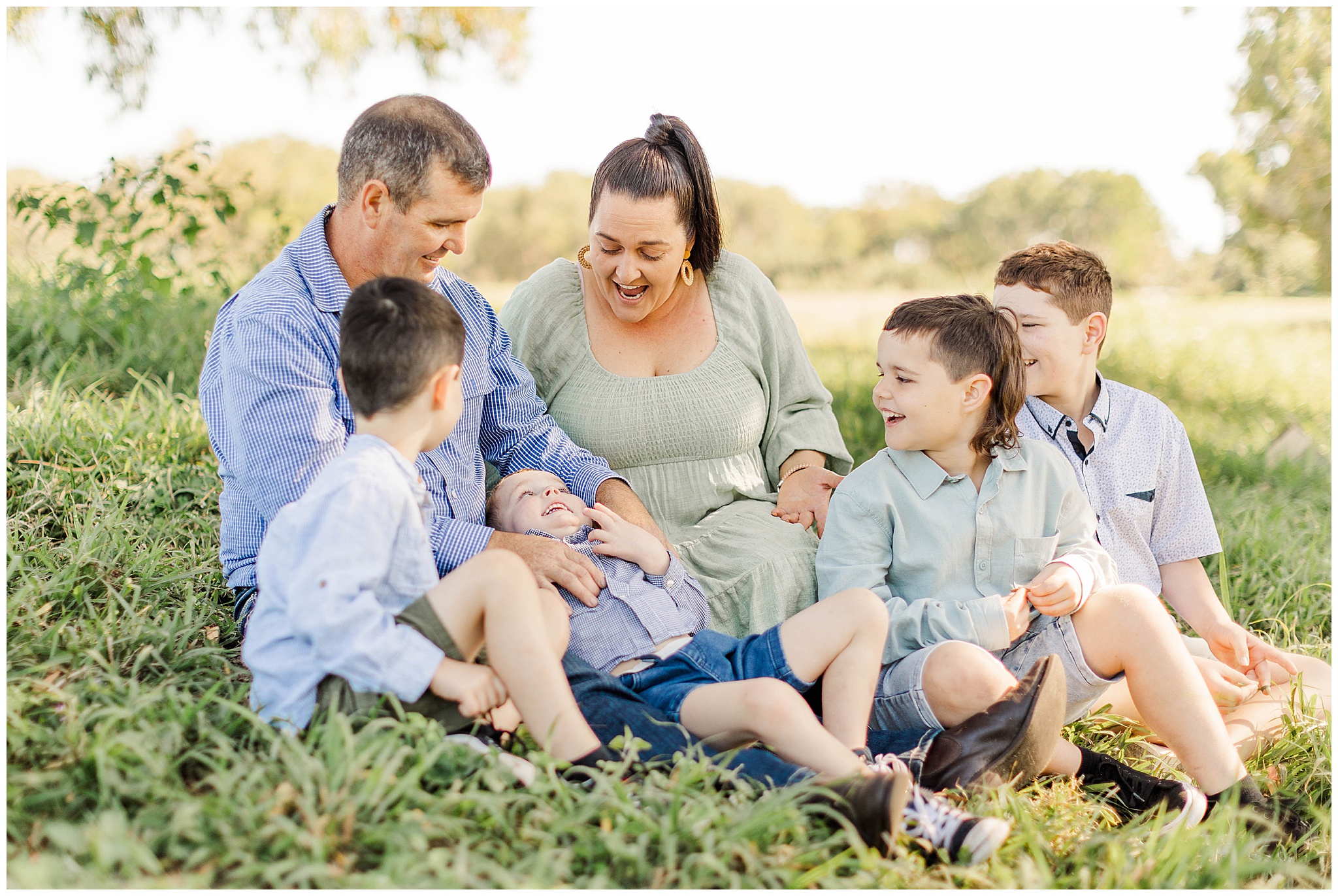 Fun and gorgeous family having their family photos updated by alyce holzy photography.