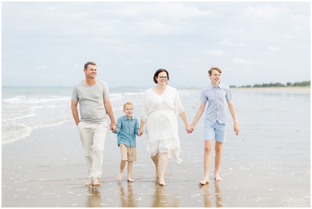 A beautiful family on the beach with Mackay photographer Alyce Holzy.