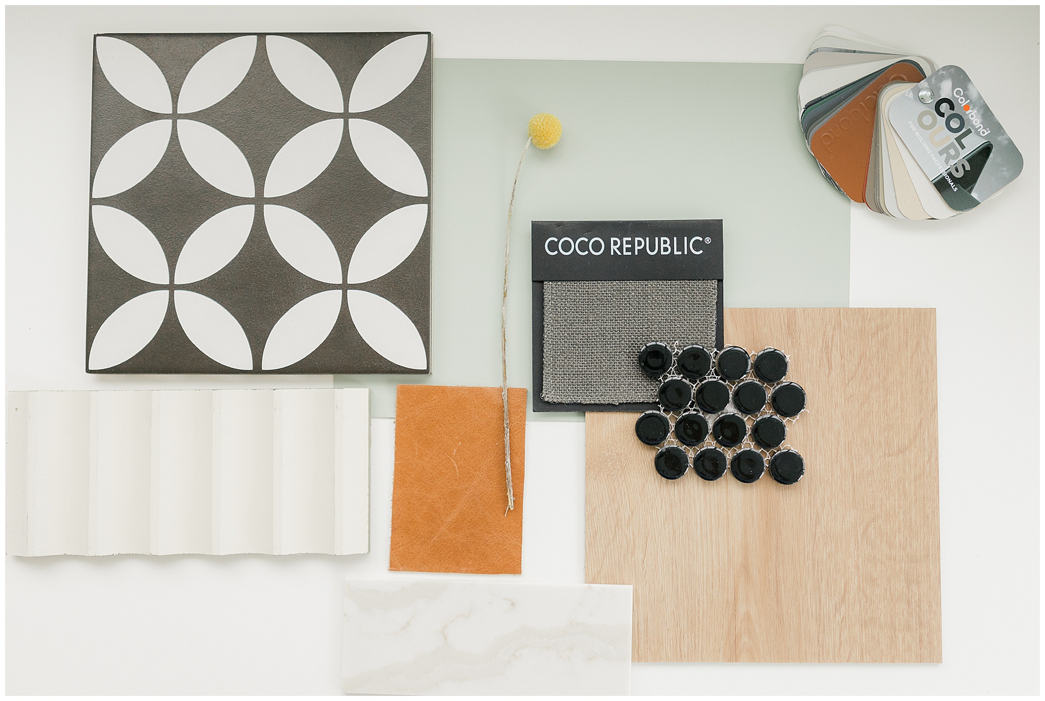 Flatlay of fabric swatches, textures, and décor details from Summit and Co.’s design process.