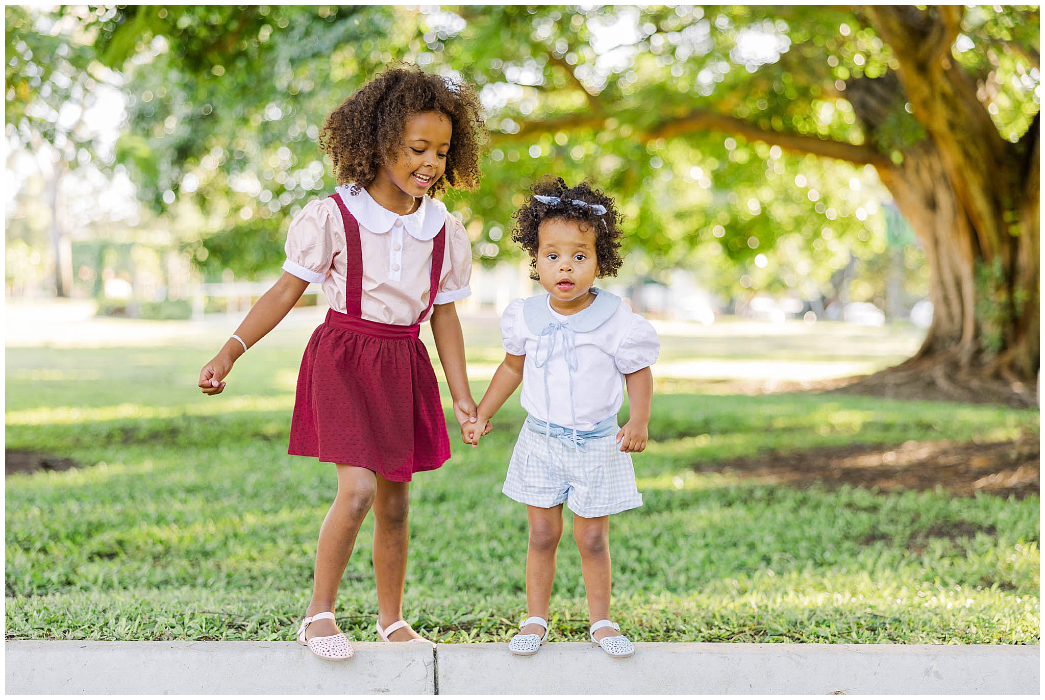 Dark skin models wearing kids fashion brand Saint Odette.